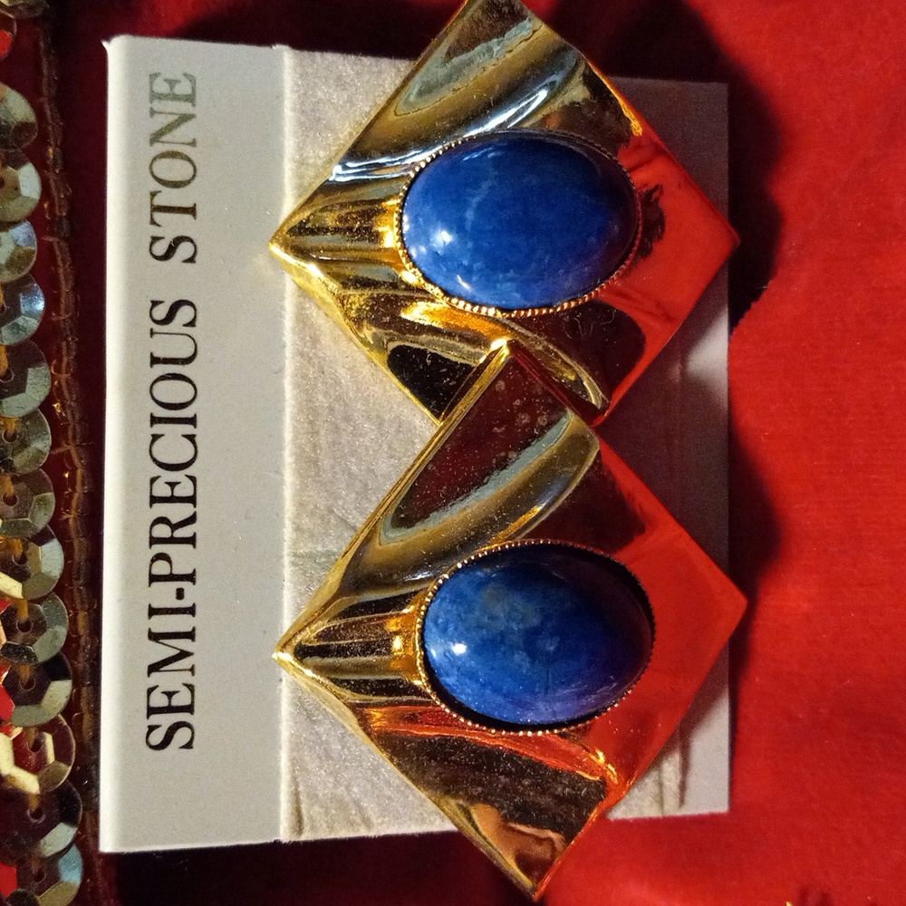 Genuine semi precious Blue Lapis  in a goldtone setting
